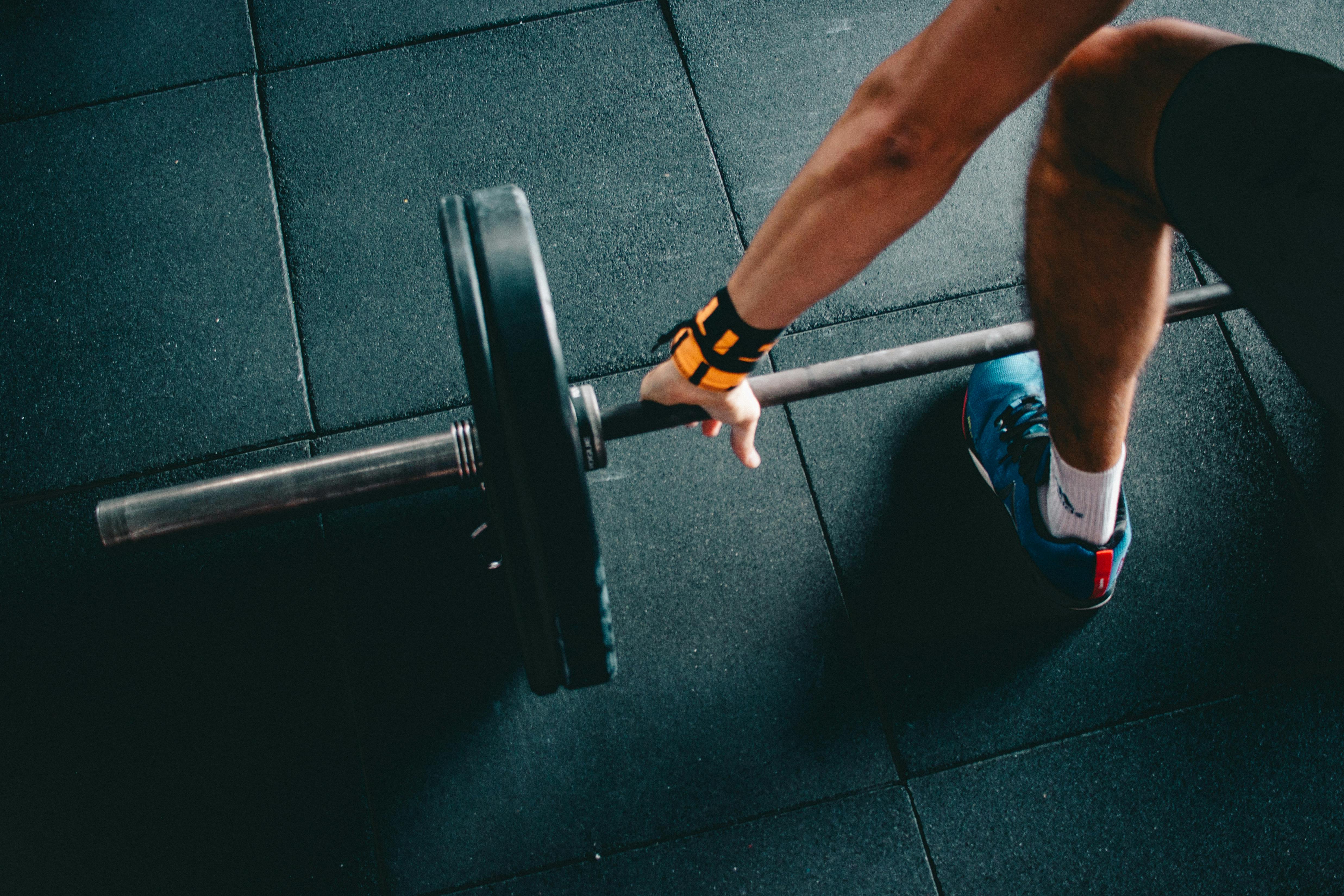 Muscular person lifting weights